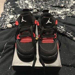 Black and red Nikes